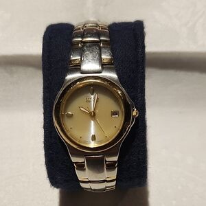 Citizen Eco-drive Two-tone Ladies Watch with Date - E011 K16784